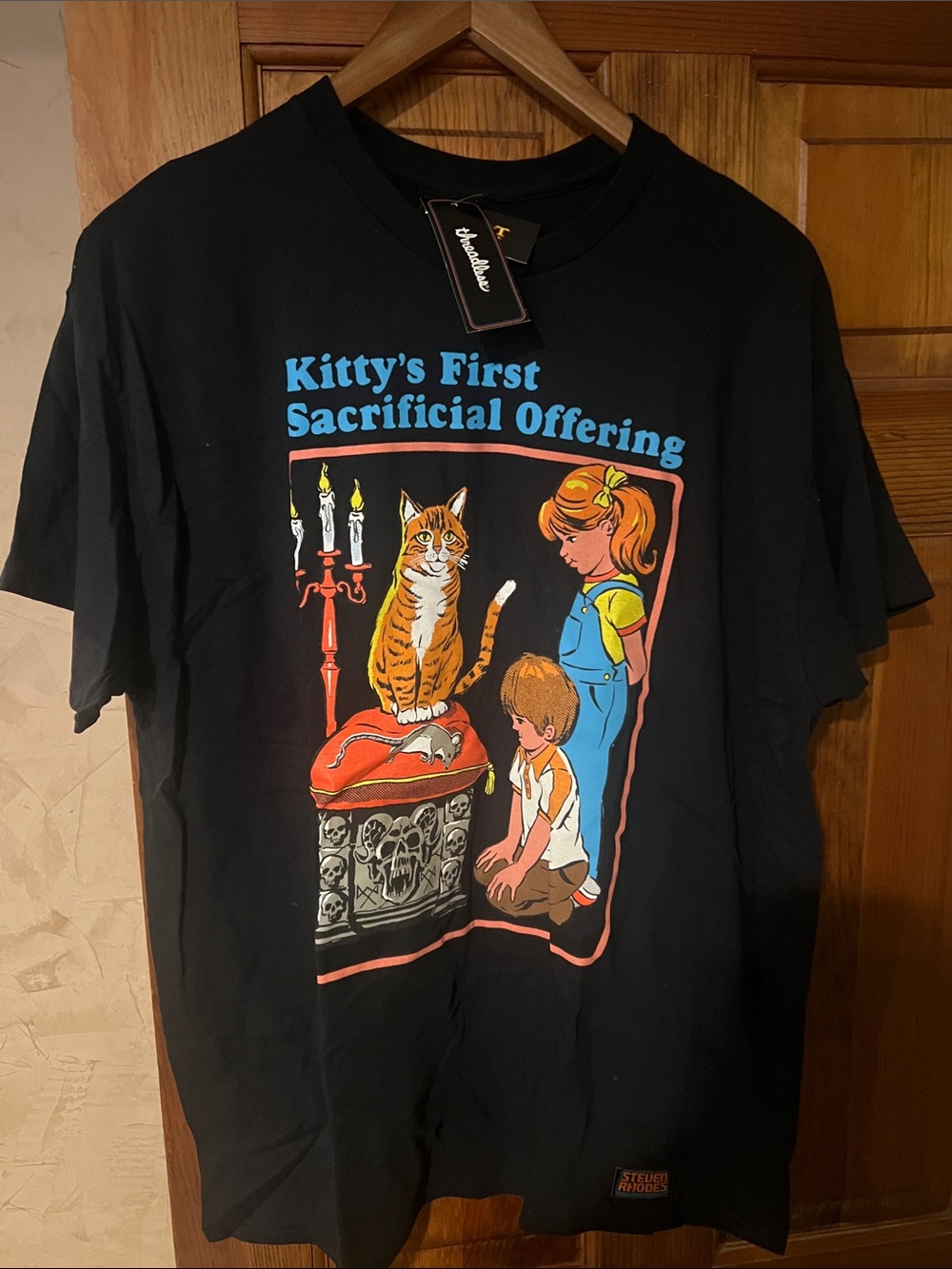 Threadless Black Tee with Multicolor Horror-Style Cat Graphic